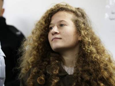 Palestinian Teen Ahed Tamimi Enters A Military Courtroom At Ofer Prison, Near The West Bank City Of Ramallah